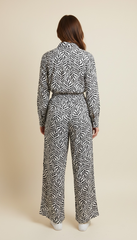 Pantalone a gamba larga fantasia foglie