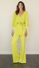 Blusa incrociata con frange sulle maniche