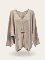 MAGLIA PONCHO CON DETTAGLIO CENTRALE ORO