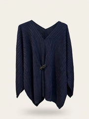 MAGLIA PONCHO CON DETTAGLIO CENTRALE ORO