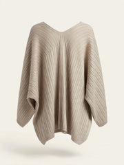 MAGLIA PONCHO CON DETTAGLIO CENTRALE ORO