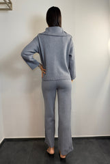 Tuta con zip e collo alto