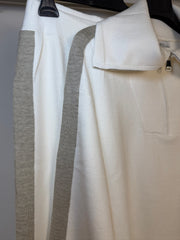 Tuta con zip e collo alto