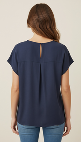 Blusa scollo a v bottoncino dietro