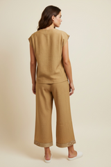 Pantalone largo con disegno catena sotto