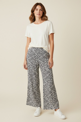 PANTALONE A GAMBA LARGA FANTASIA FOGLIE