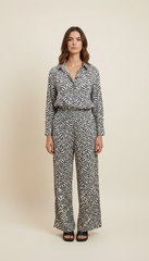 Pantalone a gamba larga fantasia foglie