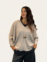 MAGLIA PONCHO CON DETTAGLIO CENTRALE ORO
