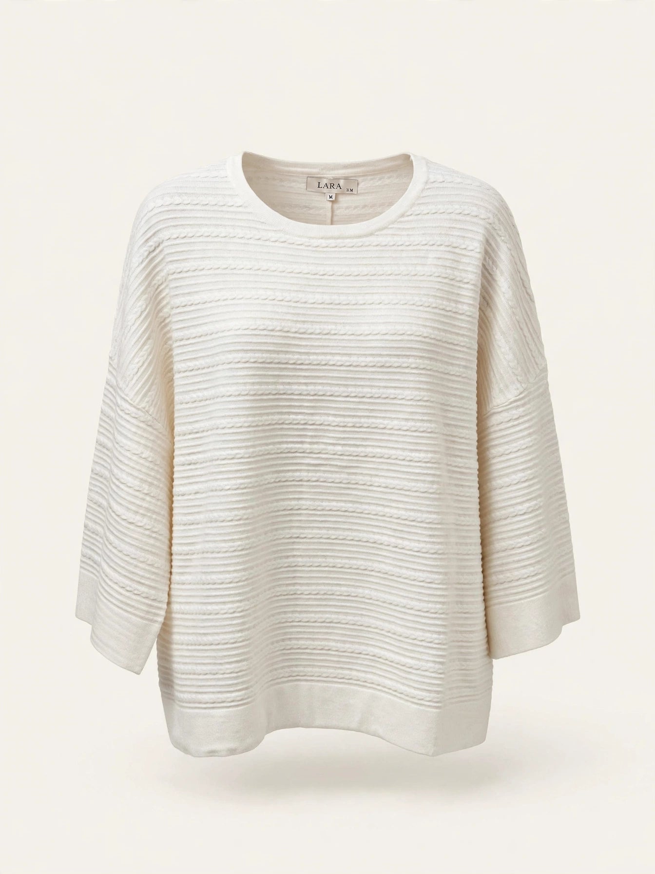 MAGLIA OVER LAVORAZINE TRECCIA E BOTTONE MANICA