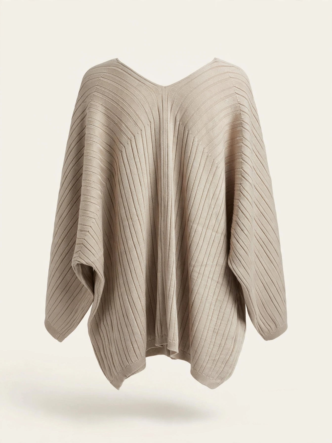 MAGLIA PONCHO CON DETTAGLIO CENTRALE ORO