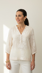 Camicia in velo con fiori e maniche a palloncino