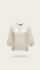 Camicia in velo con fiori e maniche a palloncino