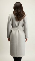 Cappotto lungo con cintura e tasche a filo